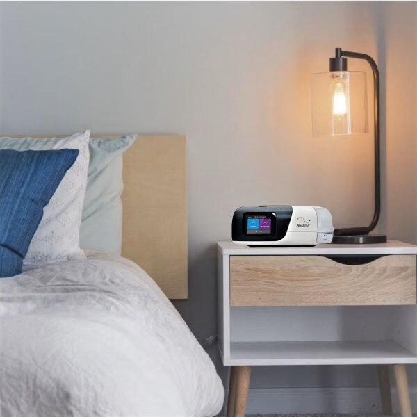 Airsense 11 CPAP on bed side table